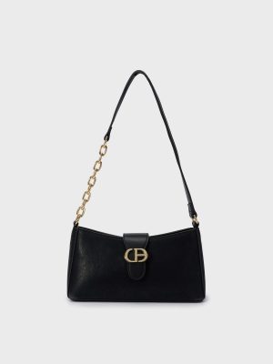 Túi xách nữ đen – biểu tượng của sự tinh tế và quyền lực công sở.